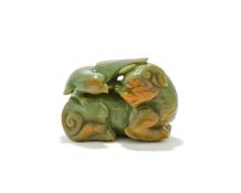 A large Chinese celadon jade carved boulder