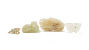 A Chinese celadon jade carving of recumbent beast