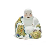 A Chinese Famille Rose figure of Budai