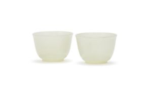 A pair of Chinese white jade cups