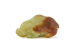 A Chinese yellow and russet jade beast