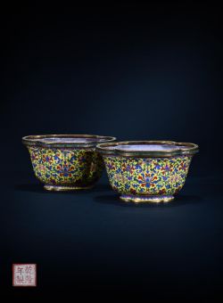 A pair of Chinese yellow ground Canton enamel 'lotus' jardiniers