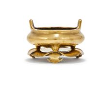A Chinese bronze tripod censer and stand