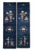 A pair of Chinese blue-ground satin chair covers