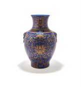 A Chinese blue ground and gilt vase