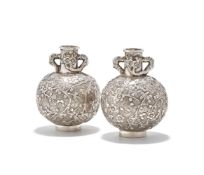 A small pair of Chinese silver vases