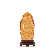 Y A Chinese carved hornbill 'Lotus pond' snuff bottle