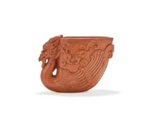 A Chinese carved aventurine glass 'Celestial rooster' libation cup