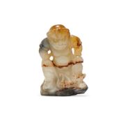 A Chinese black and white jade 'Foreigner' carving