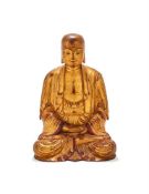 A Chinese gilt and lacqured figure of a seated buddha
