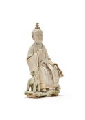 A rare Chinese qingbai partially glazed porcelain figure of a seated immortal