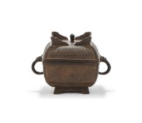 A Chinese bronze food vessel and cover
