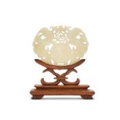 A carved Chinese white jade plaque