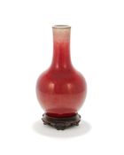 A Chinese red-glazed flambé bottle vase
