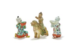 Two Chinese export porcelain figures of kneeling boys