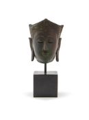 A bronze head of Buddha
