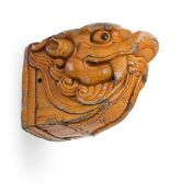 A Chinese yellow glazed ridge tile