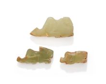 Three Chinese celadon jade tiger carvings