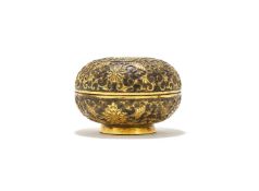 A Chinese parcel gilt bronze box and cover