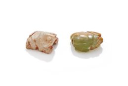 Two miniature jade frogs