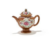 A Chinese famille rose cafe au lait ground bullet-shaped teapot