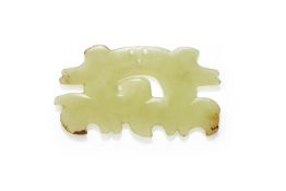 A Chinese celadon jade 'cloud scroll' ornament