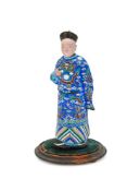 A Chinese polychrome painted clay nodding head figure of Mandarin