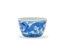 A small Chinese blue and white wine 'Dragon' cup