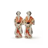 A large pair of Japanese Imari figures of Bijin