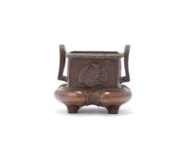 A Japanese bronze tripod censer