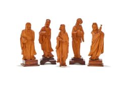 A group of five Chinese box wood carved figures of Daoist deities