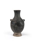 A large Chinese black pottery vase