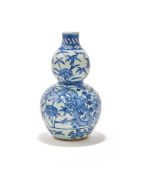A Chinese blue and white 'Dragon' double-gourd vase