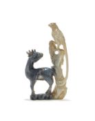 A Chinese black and white jade 'Crane and deer' carving group