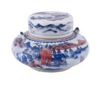 A Chinese blue and white and iron red jar and cover
