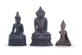 Three South-East Asian bronze figures of Buddha