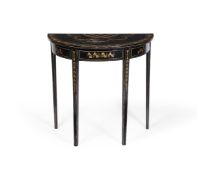 A GEORGE III BLACK AND POLYCHROME PAINTED AND PARCEL GILT DEMI-LUNE SIDE TABLECIRCA 1800