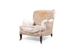 AN EDWARDIAN HOWARD & SONS `BRIDGEWATER' EASY ARMCHAIR, EARLY 20TH CENTURY
