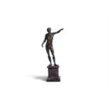 CIRCLE OF CAMELIO- A BRONZE FIGURE OF A STANDING MAN, EARLY 16TH CENTURY
