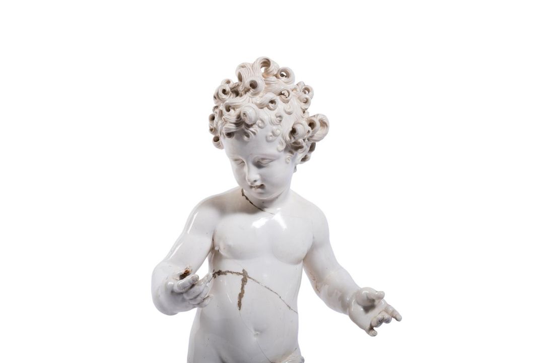 A CREAMWARE FIGURE OF A CHILD, ITALIAN, 18TH CENTURY - Image 2 of 4