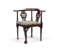 A MAHOGANY AND BEECH CORNER CHAIR OF GEORGE II STYLE