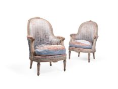 A PAIR OF WHITE PAINTED BEECH BERGÈRES OF LOUIS XVI STYLE