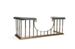 AN UPHOLSTERED BRASS CLUB FENDER, EARLY 20TH CENTURY