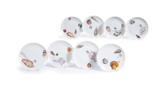 EIGHT LIMOGES PORCELAIN PLATES FOR DELVAUX PARIS BY G. NEILZ, MODERN