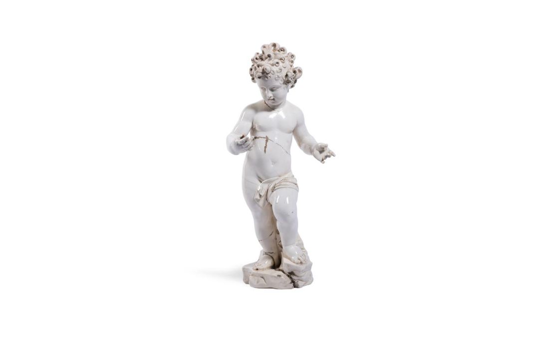 A CREAMWARE FIGURE OF A CHILD, ITALIAN, 18TH CENTURY - Image 1 of 4