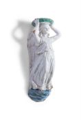 A MAIOLICA WALL FITTING IN DELLA ROBBIA STYLE AND MODELLED AS A WINGED ANGEL, ITALIAN, 19TH CENTURY