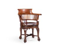 A MAHOGANY AND TEAK OR CHINESE HARDWOOD REVOLVING DESK CHAIR POSSIBLY CHINESE EXPORT