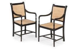 Y A PAIR OF EBONY ARMCHAIRS, IN GEORGE III STYLE, LATE 20TH OR EARLY 21ST CENTURY