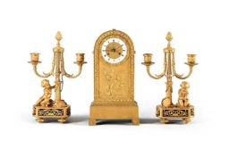 A FRENCH EMPIRE ORMOLU CLOCK CASE AND DIAL AND A PAIR OF CANDELABRA, EARLY 19TH CENTURY AND LATER