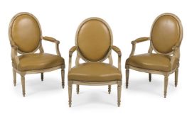 A GROUP OF THREE BEECHWOOD AND LEATHER UPHOLSTERED FAUTEUILS, FRENCH, SECOND HALF 19TH CENTURY